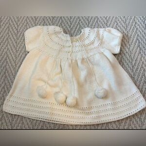 Adorable Knit Baby Dress with Pom Poms